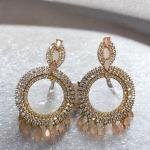 Sk-Jewellers Oval and Pear Shape Swarovski Danglers – Elegant Silver & Golden Earrings – Perfect for Weddings, Parties, and Special Occasions